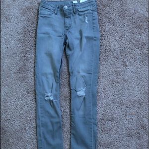 grey ripped jeans